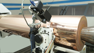 May khắc trục in ống đồng